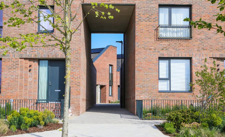 View through a pedestrian walkway between the new homes at Brabazon