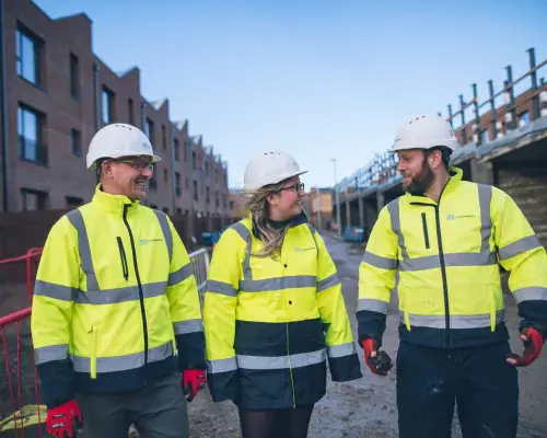 Three YTL Developments employees smiling