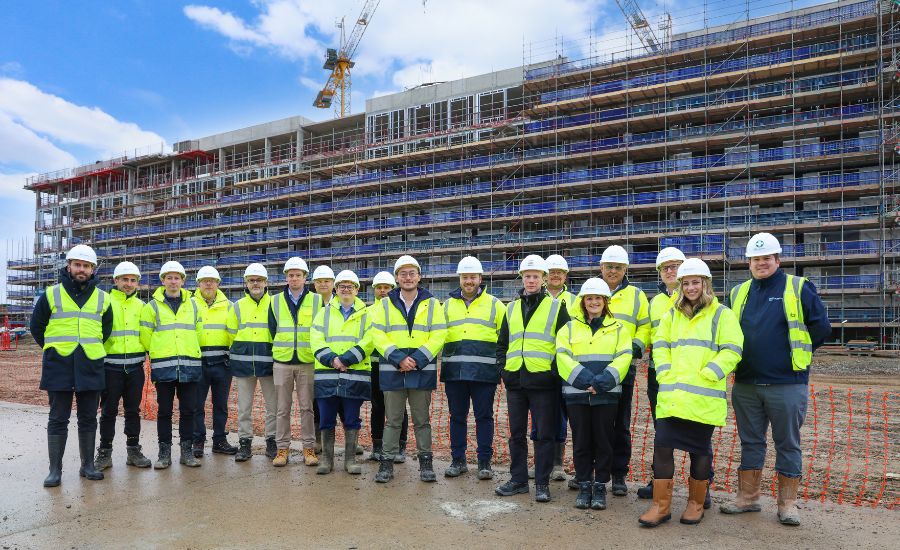 Staff from YTL Developments in front of The Dials building under construction